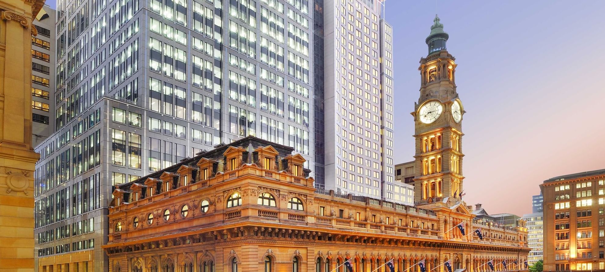 Exterior view of The Fullerton Hotel Sydney with clock tower